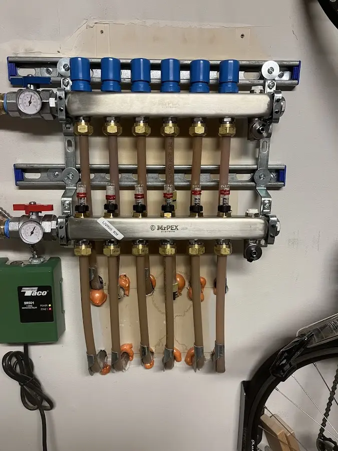 Plumber performing Water Heater Repair at a residential property in Holyoke